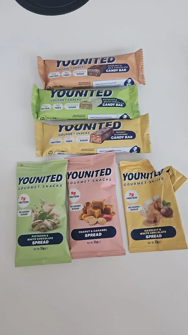 Real YOUNITED candy bar and spread samples laid out on a table